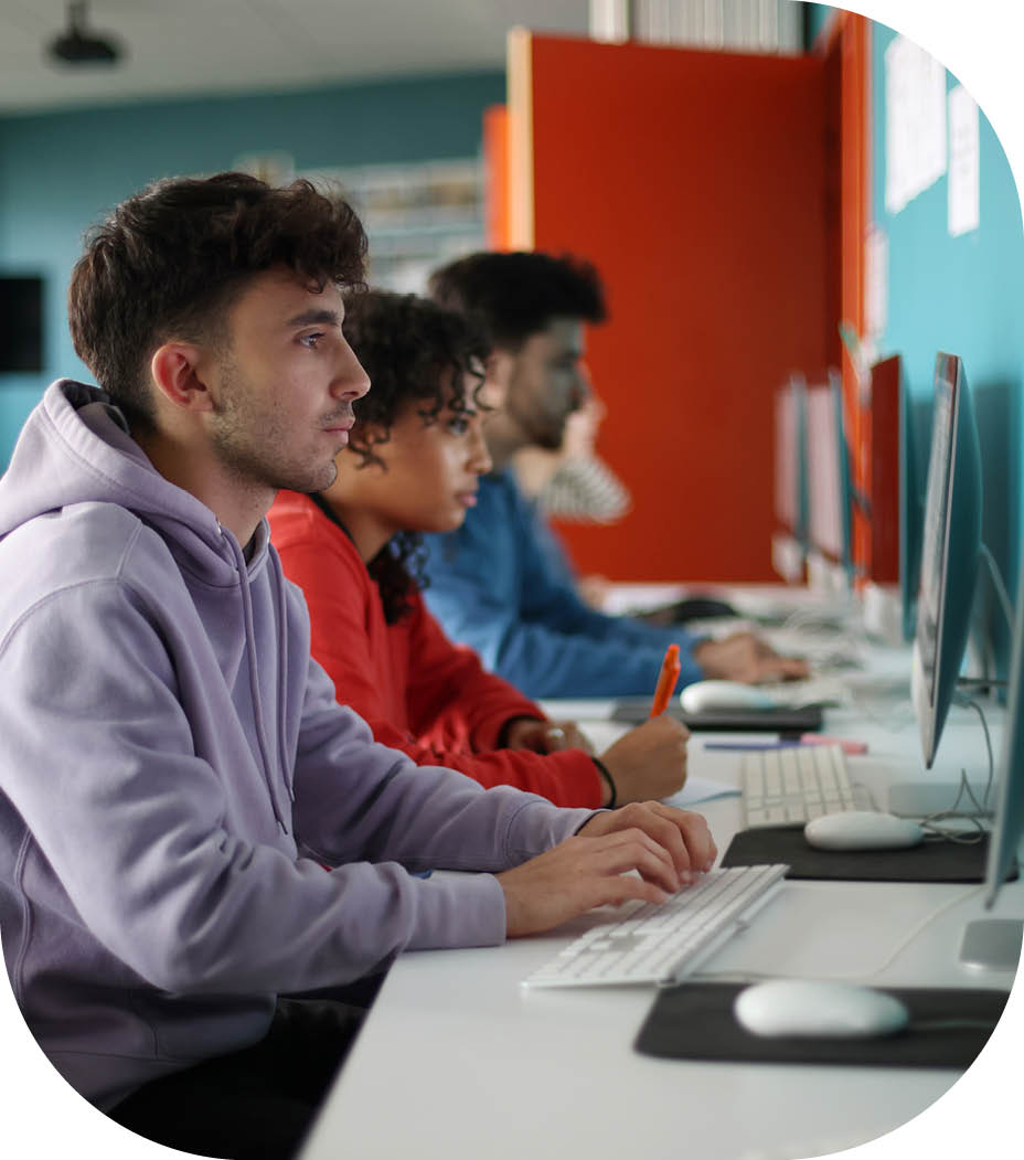 Students sitting at their desk in classroom at university