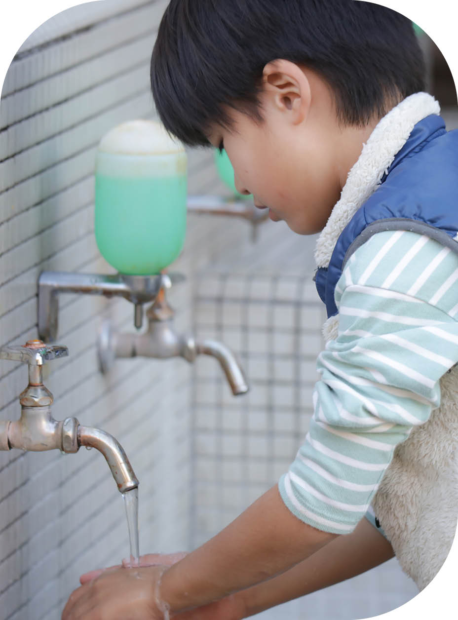 boy washing hands
